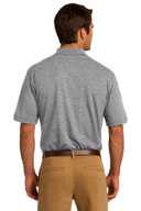 Port & Co ®  Core Blend Jersey Knit Pocket Polo. KP55P