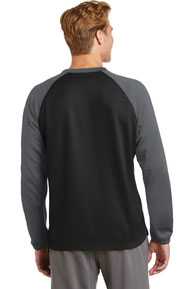 DISCONTINUED  Sport-Tek ®  Sport-Wick ®  Raglan Colorblock Fleece Crewneck. ST242